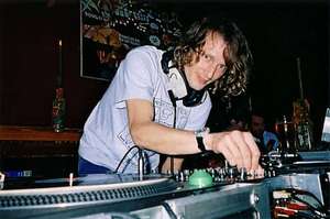 DJ KripStar spinning a Reggae classic by the Scorpions, minus the hat at the legendary Coconut pub, Kingston upon Thames 2004